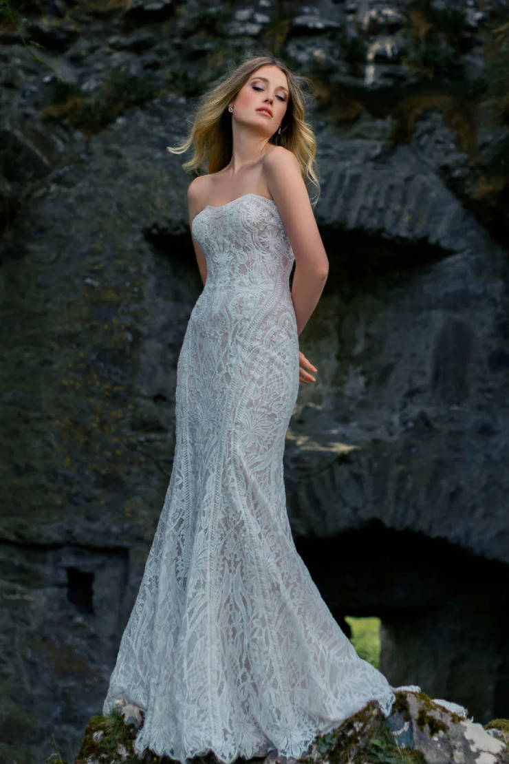 Model wearing a white gown by Wilderly Bride